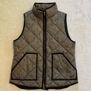 Black and cream herringbone J.Crew down vest